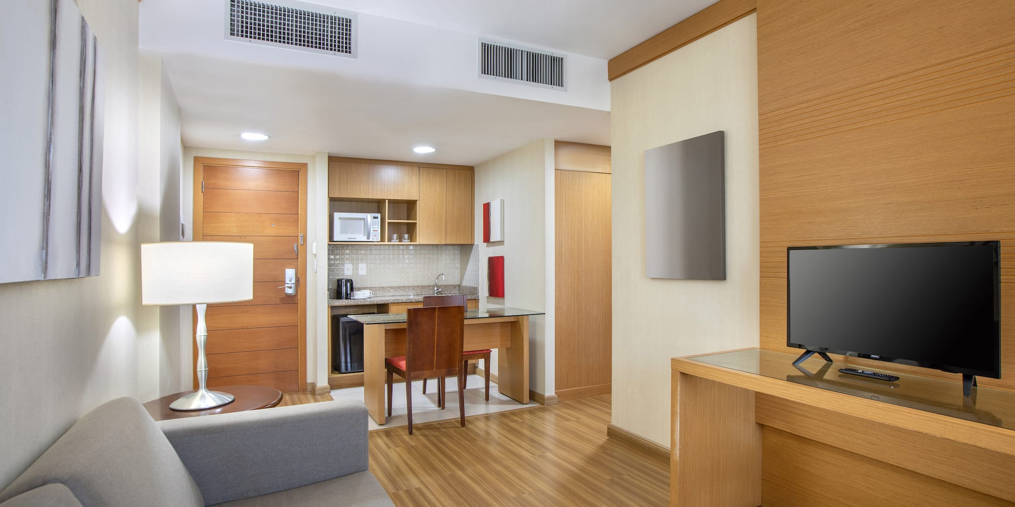 a room with a tv and a table