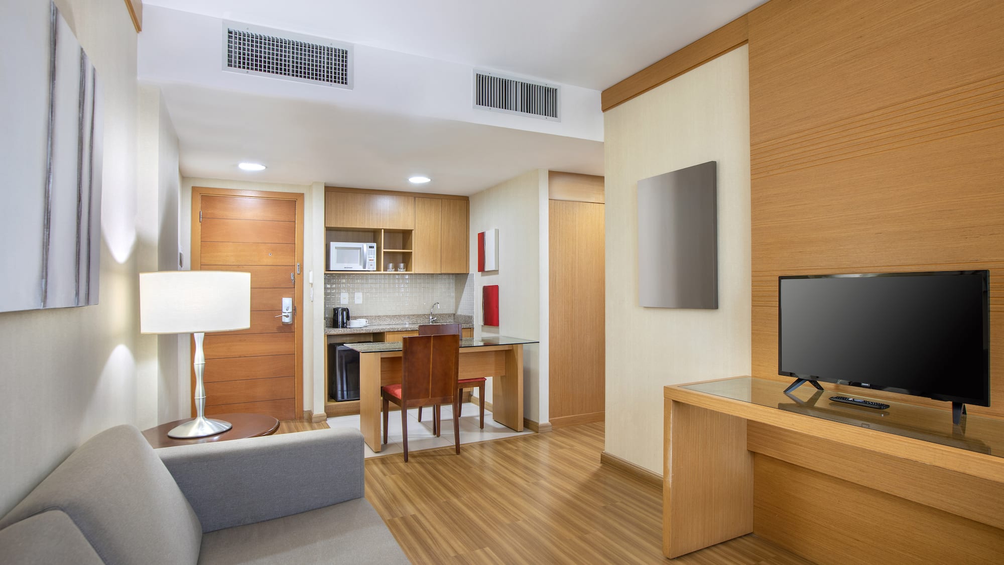 a room with a tv and a table