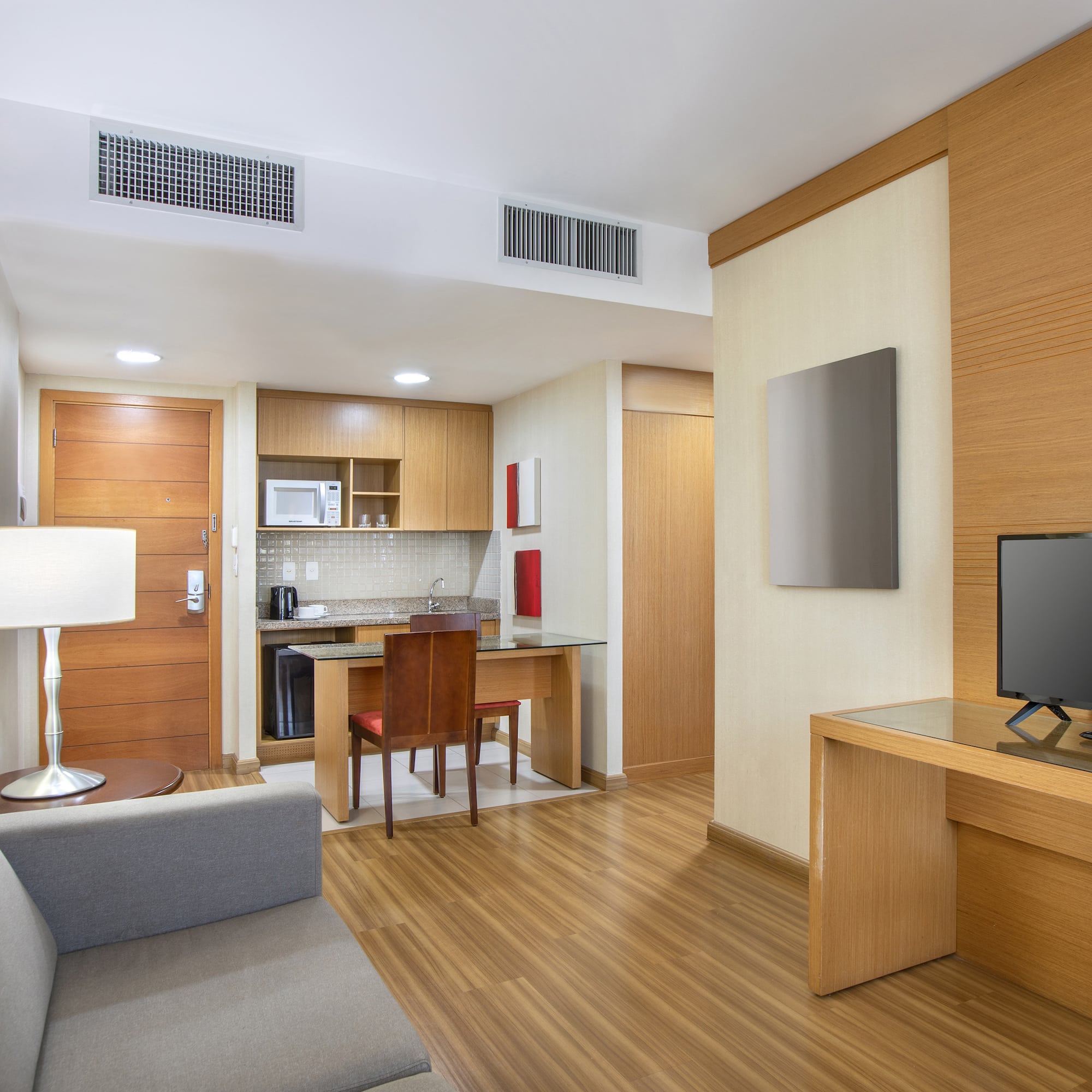 a room with a tv and a table