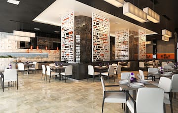 a restaurant with tables and chairs