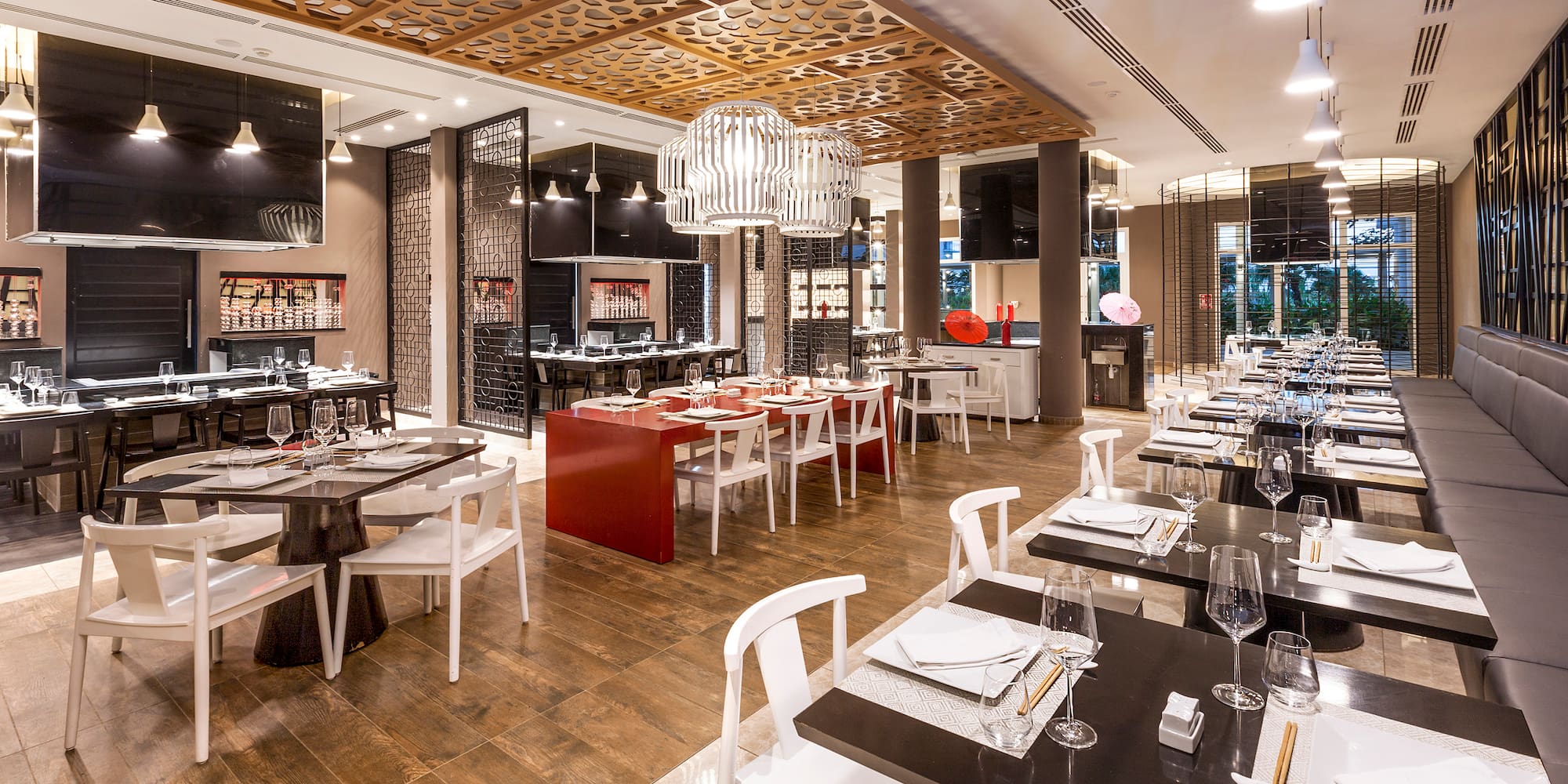 a restaurant with tables and chairs