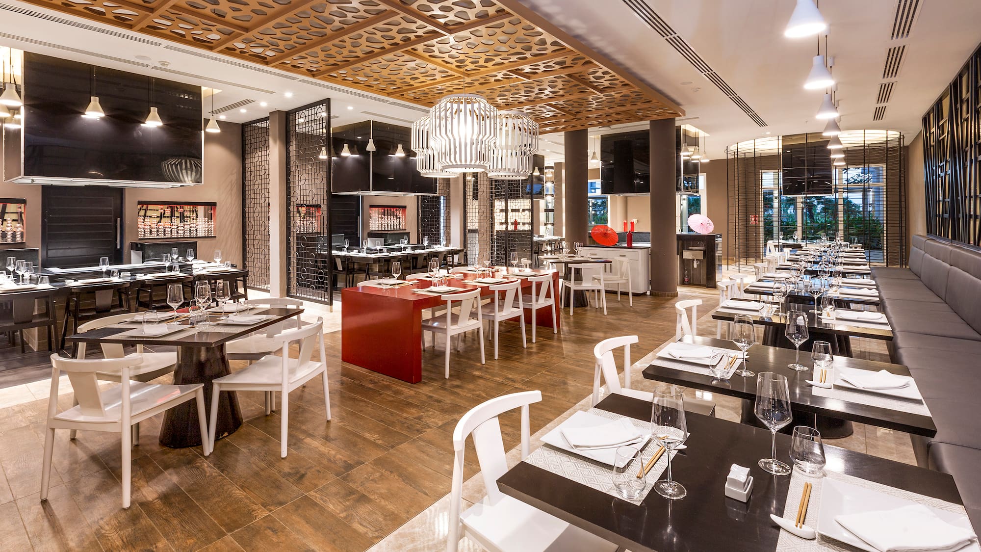 a restaurant with tables and chairs