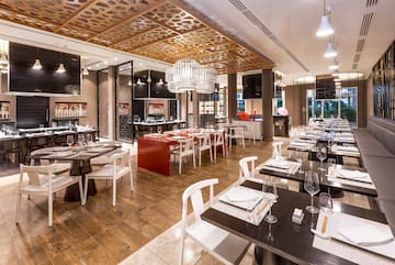 a restaurant with tables and chairs