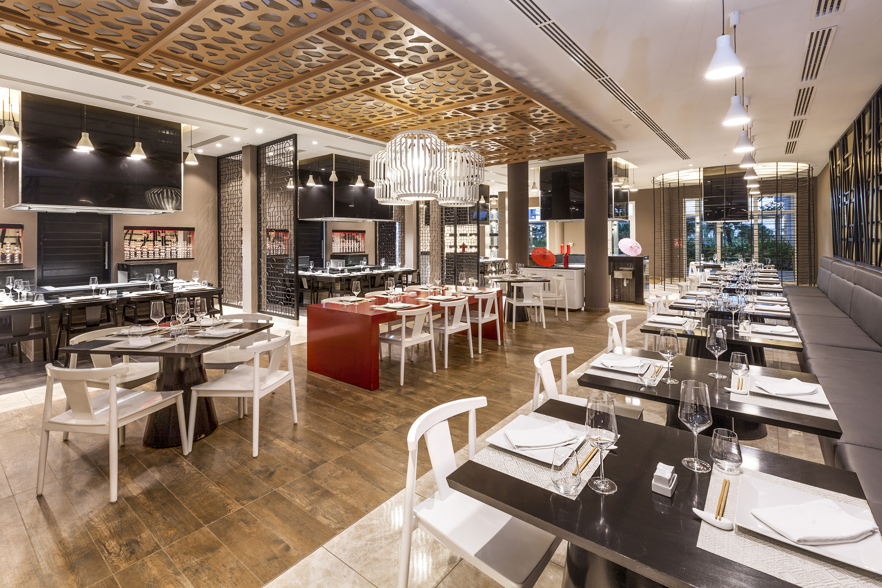 a restaurant with tables and chairs