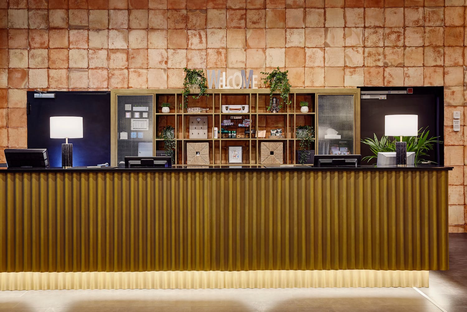 a reception desk in a hotel