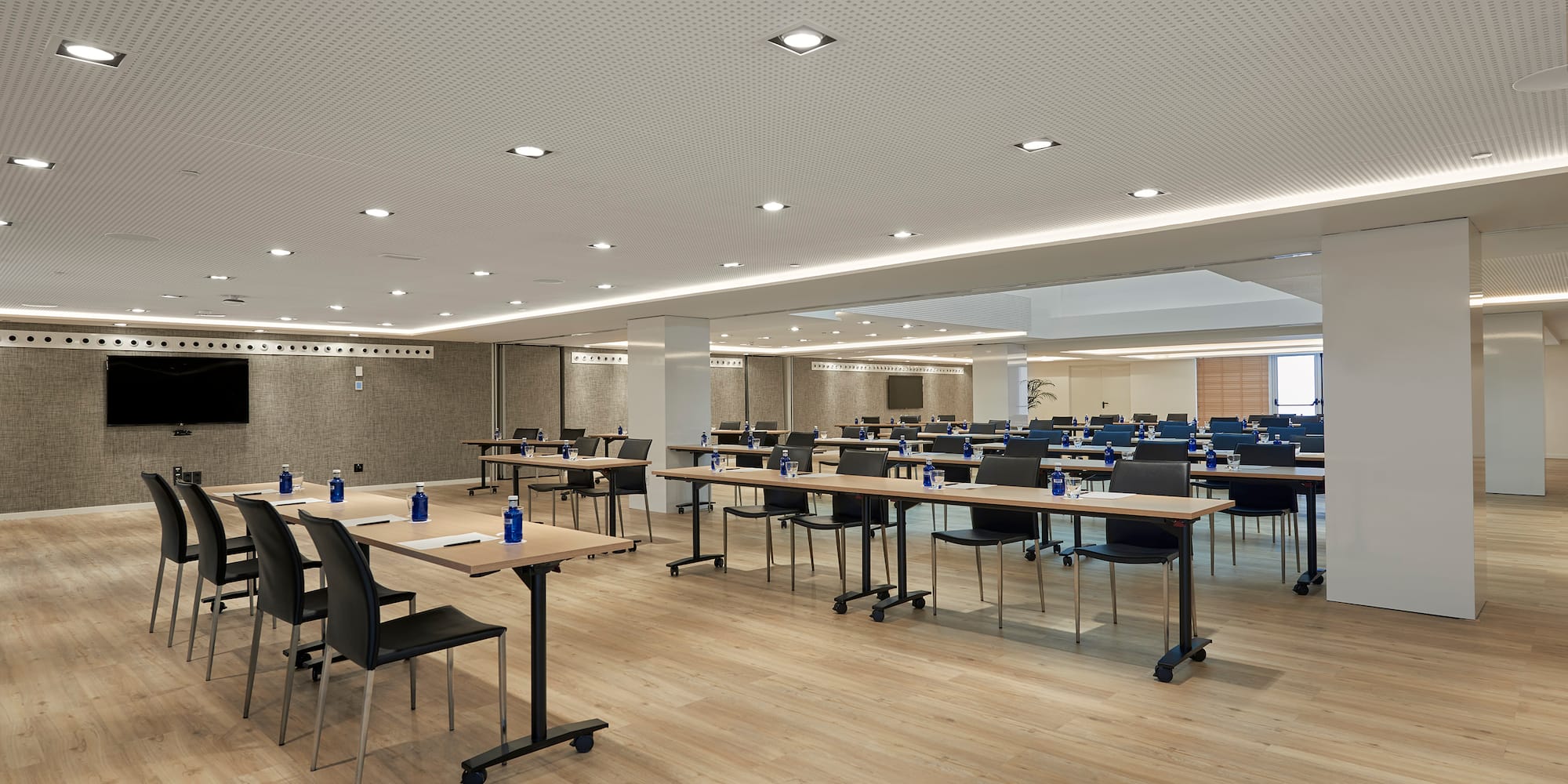 a room with tables and chairs