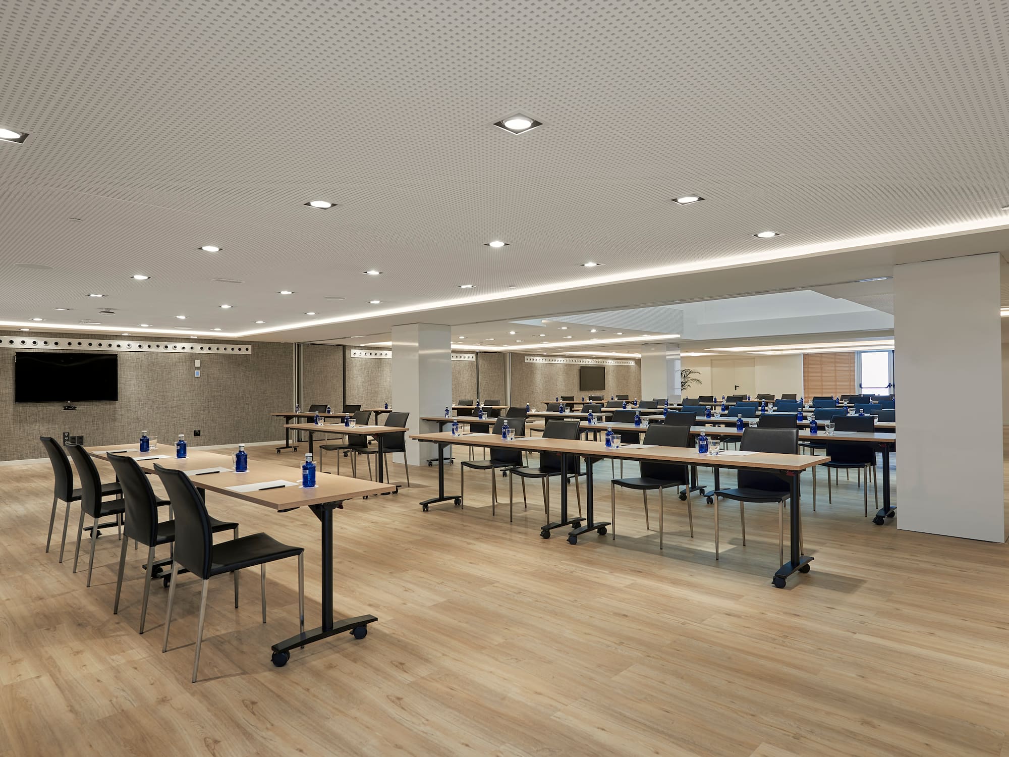 a room with tables and chairs