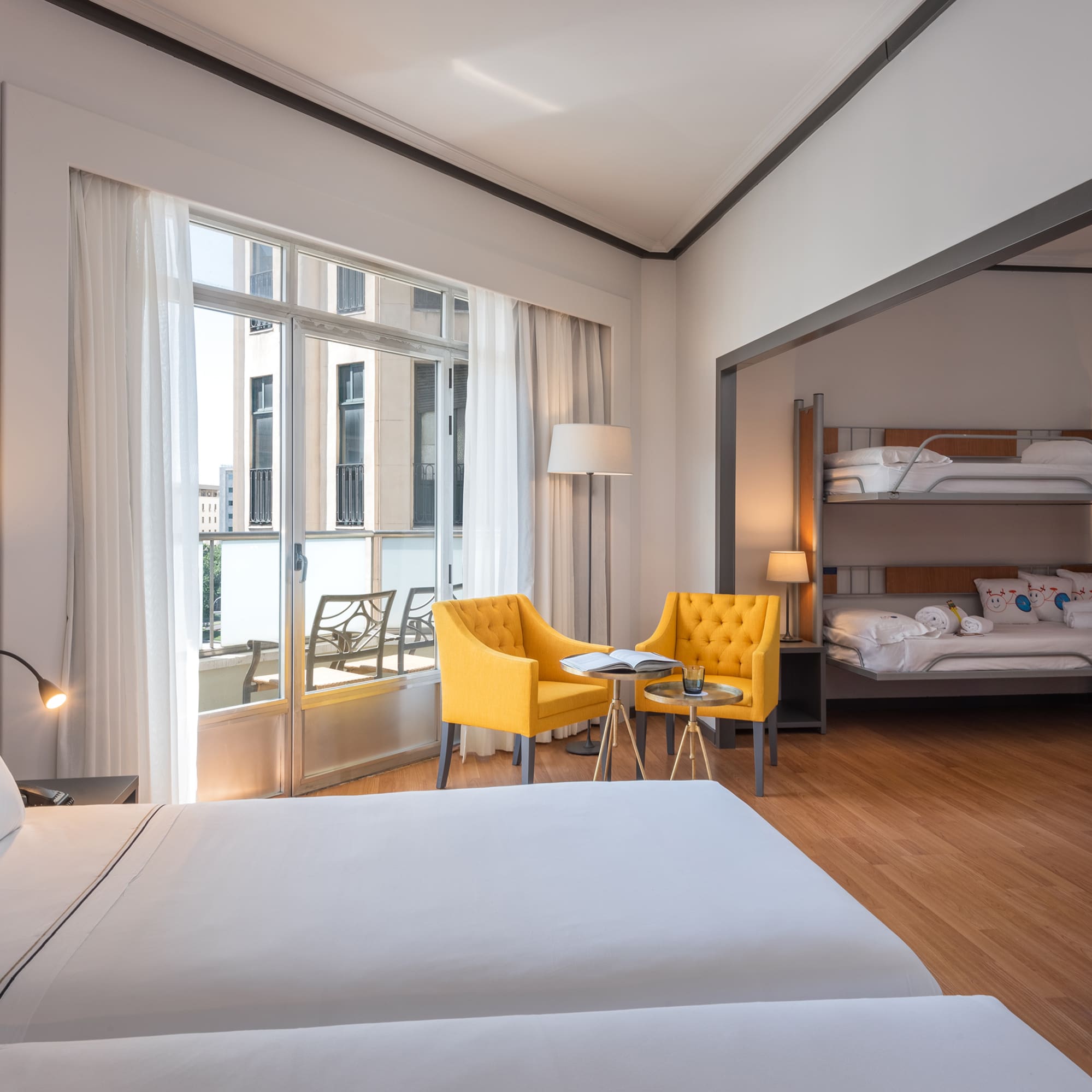 a room with bunk beds and a table