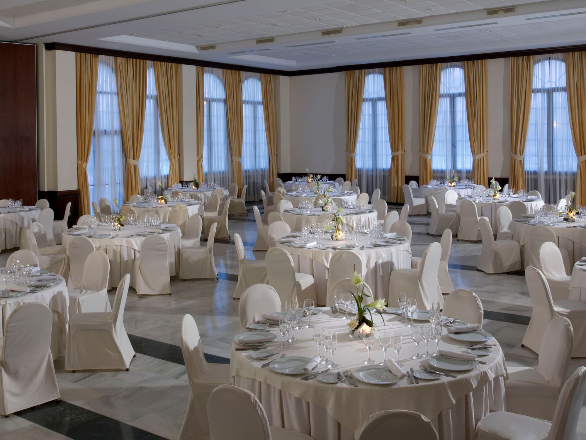 a room with tables and chairs