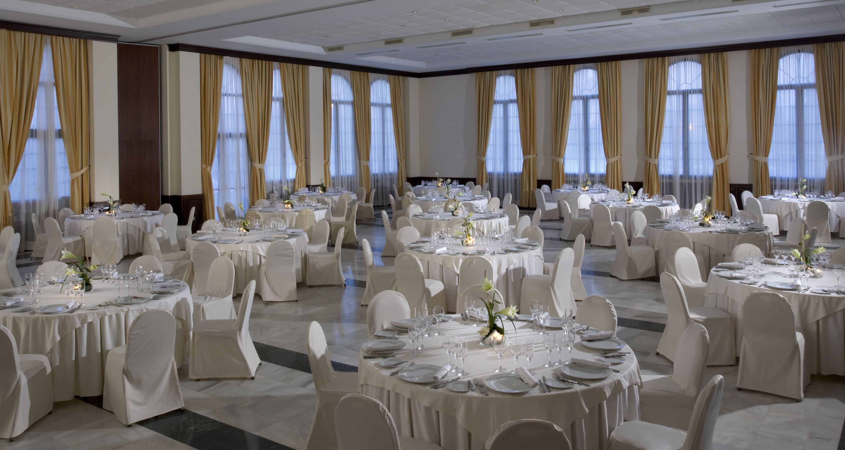 a room with tables and chairs