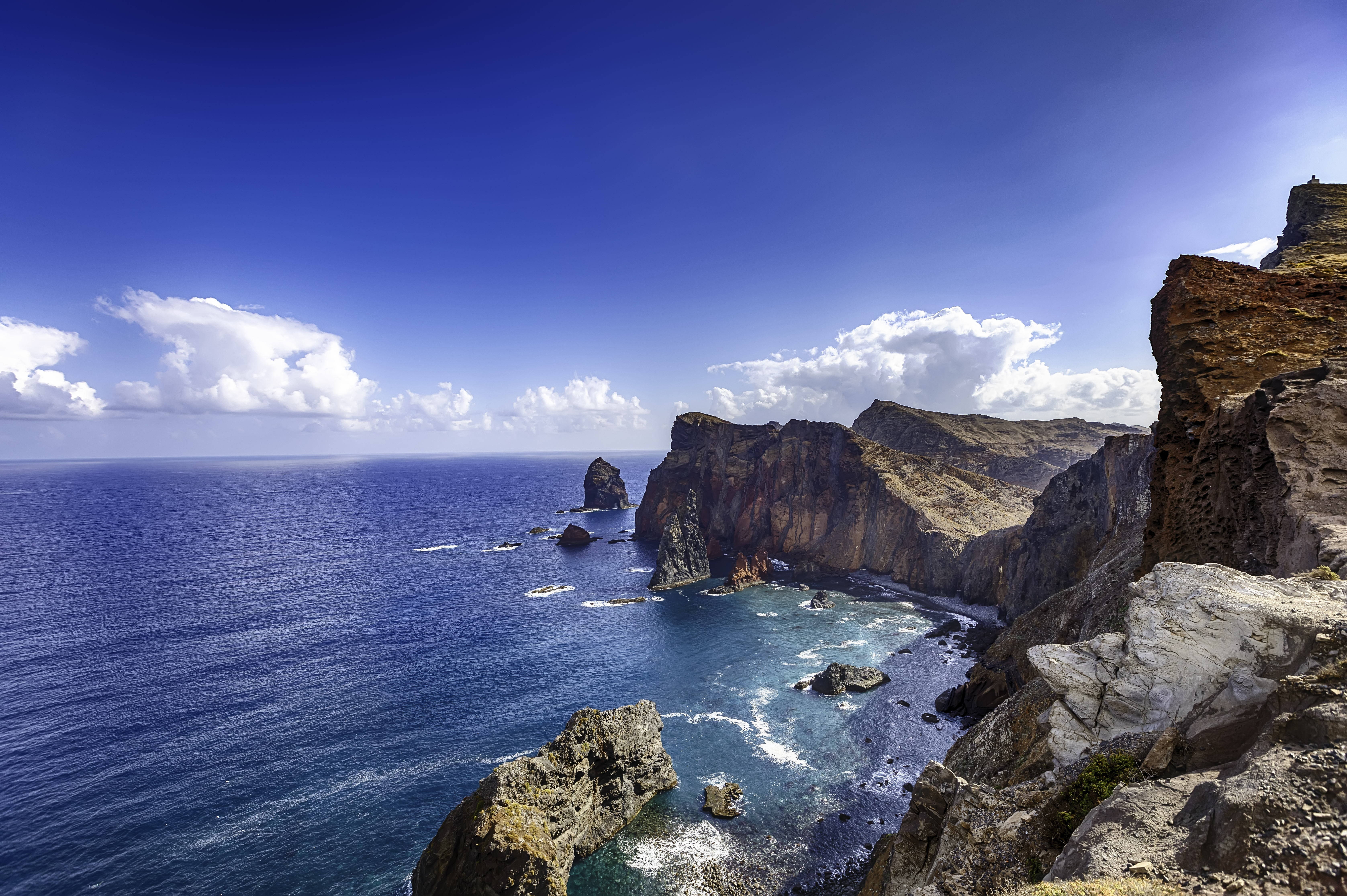 a rocky cliffs and water