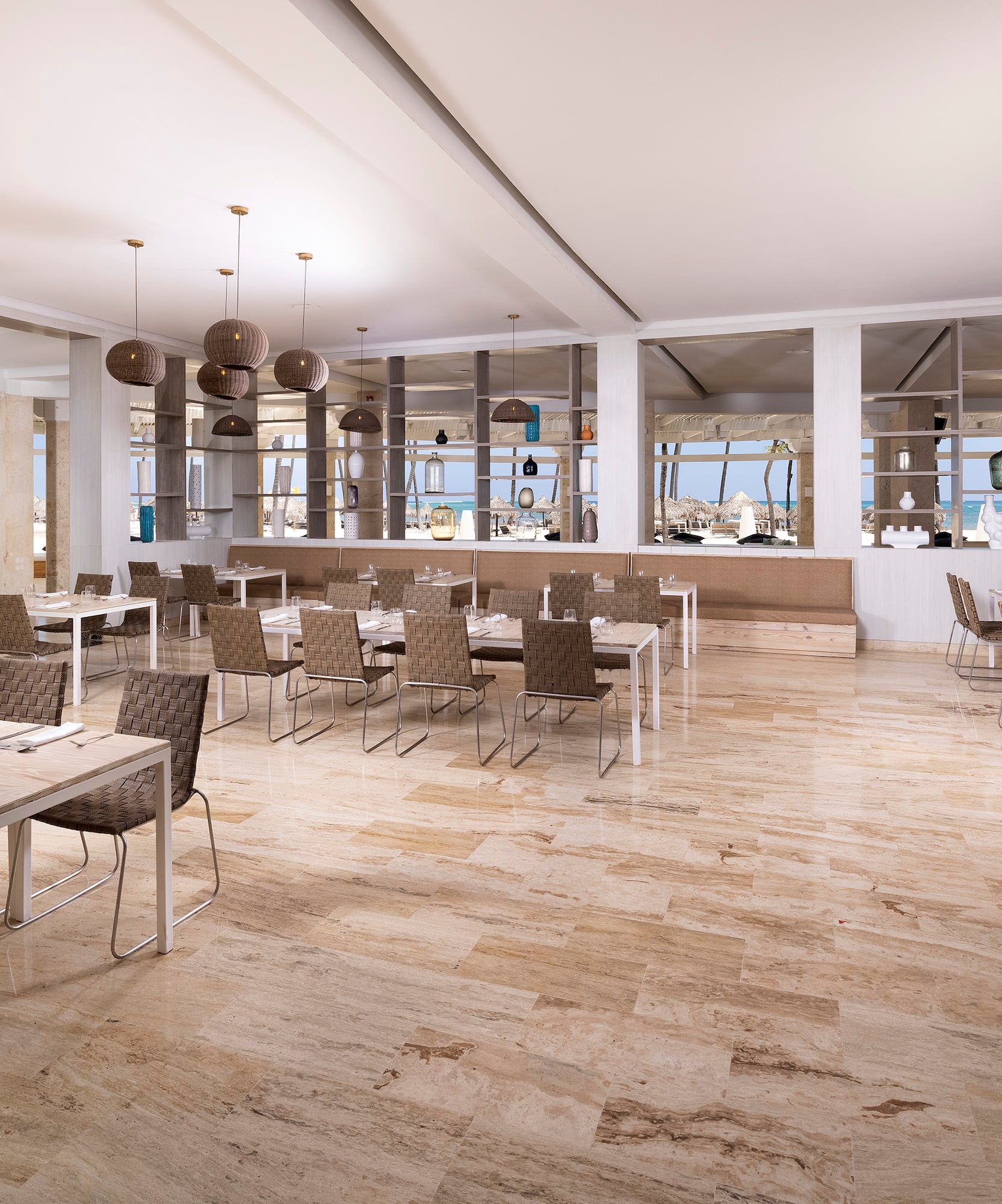 a large room with tables and chairs