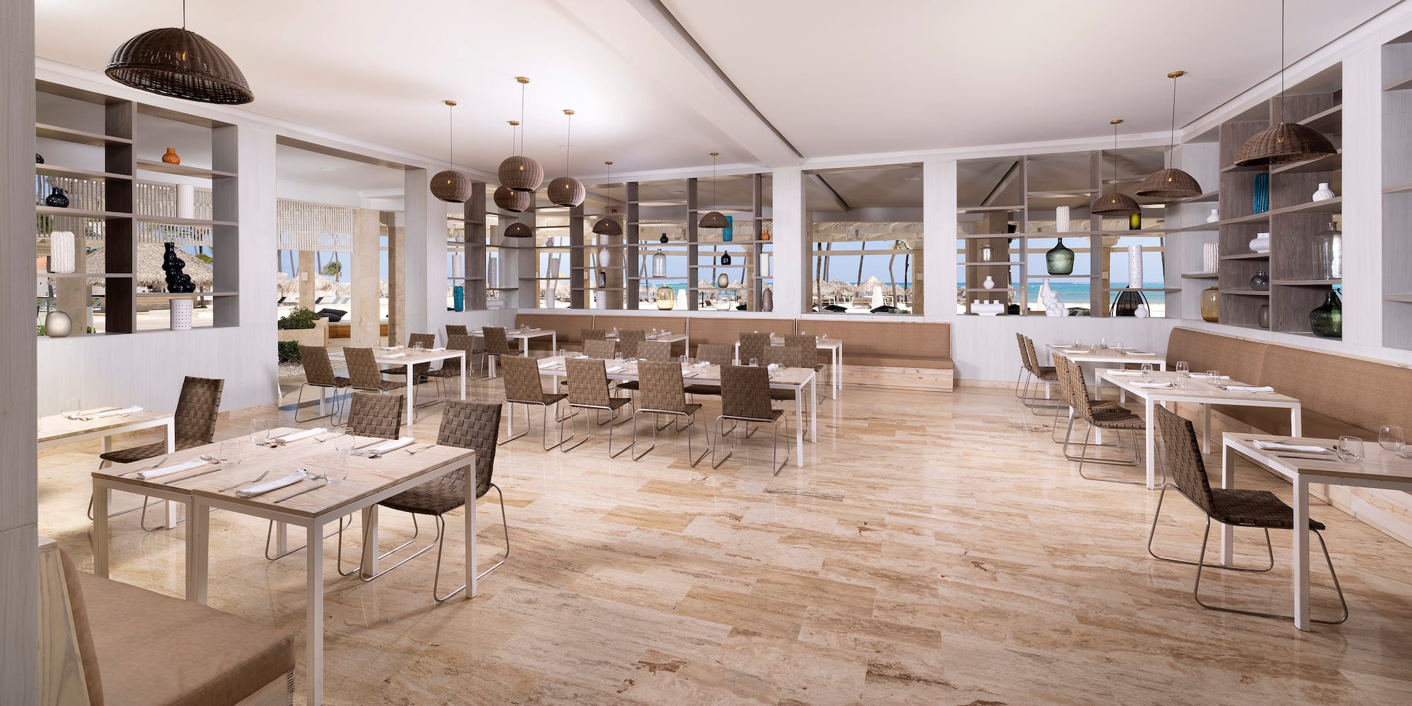 a large room with tables and chairs