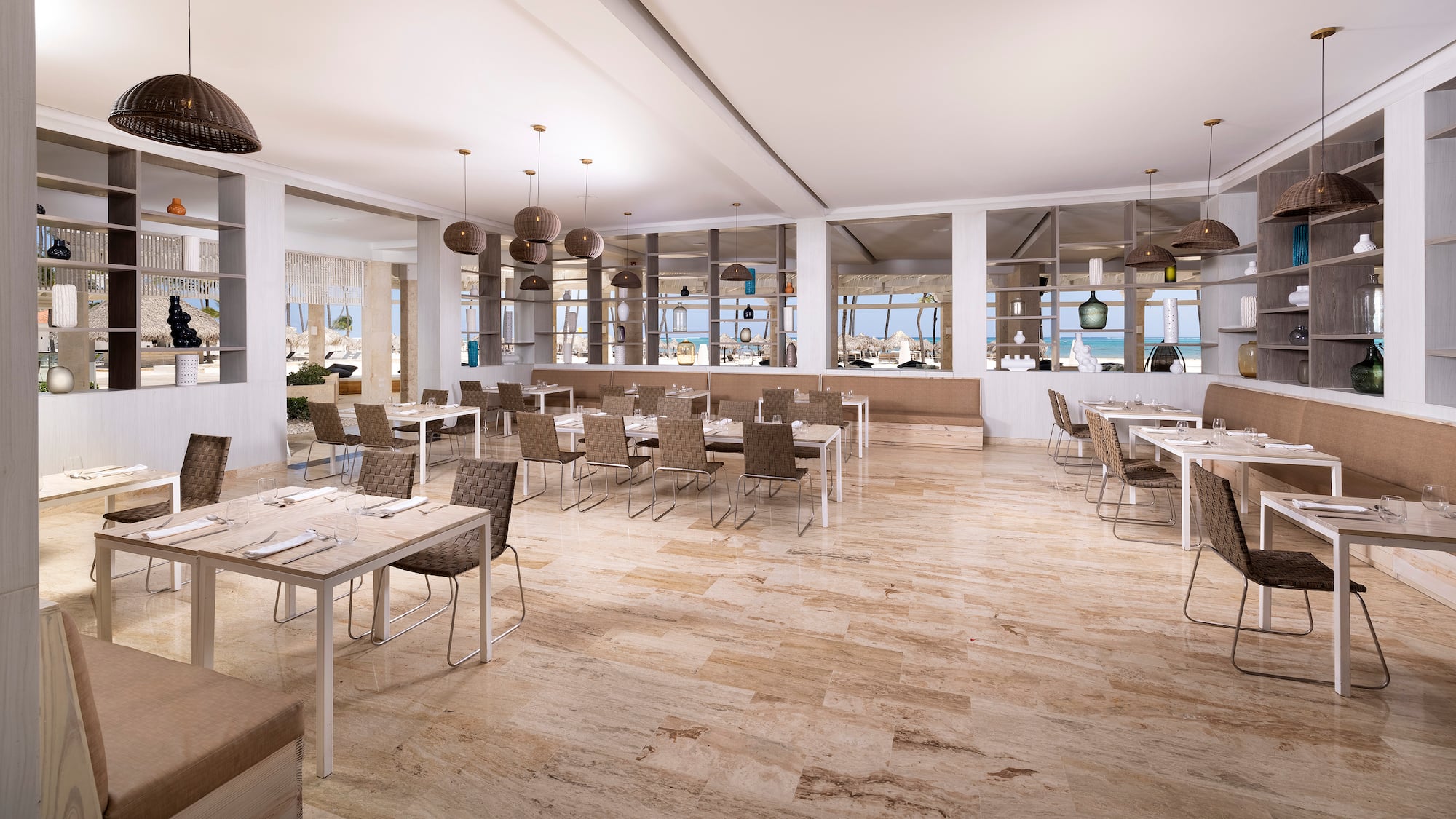 a large room with tables and chairs