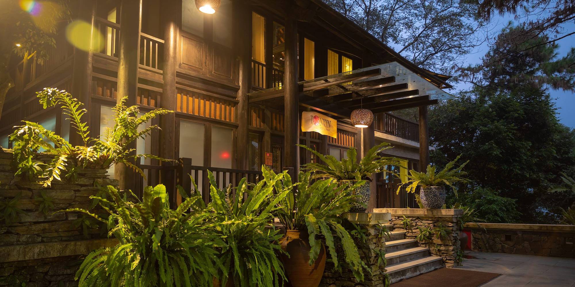 a building with plants in pots