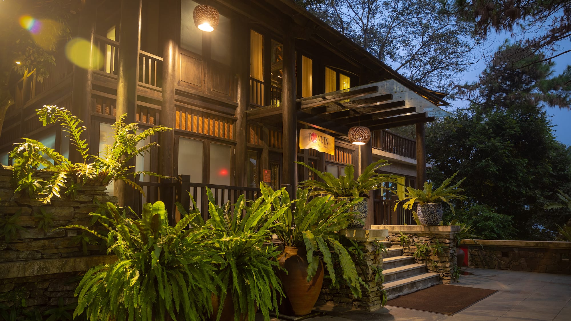 a building with plants in pots