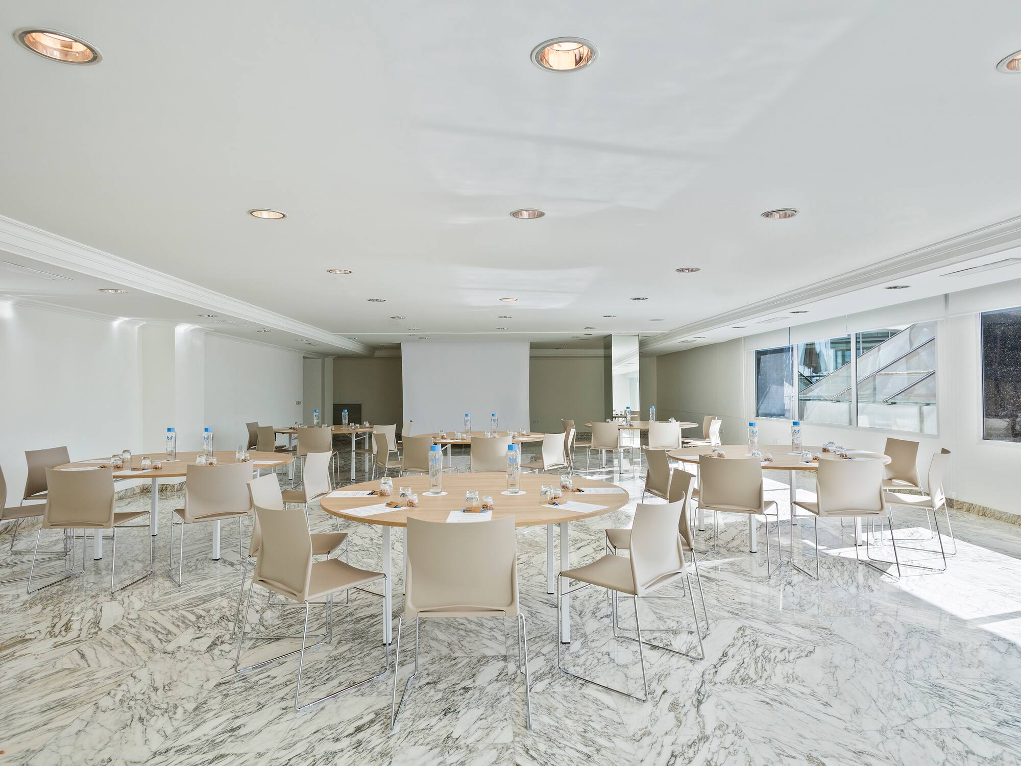 a room with tables and chairs