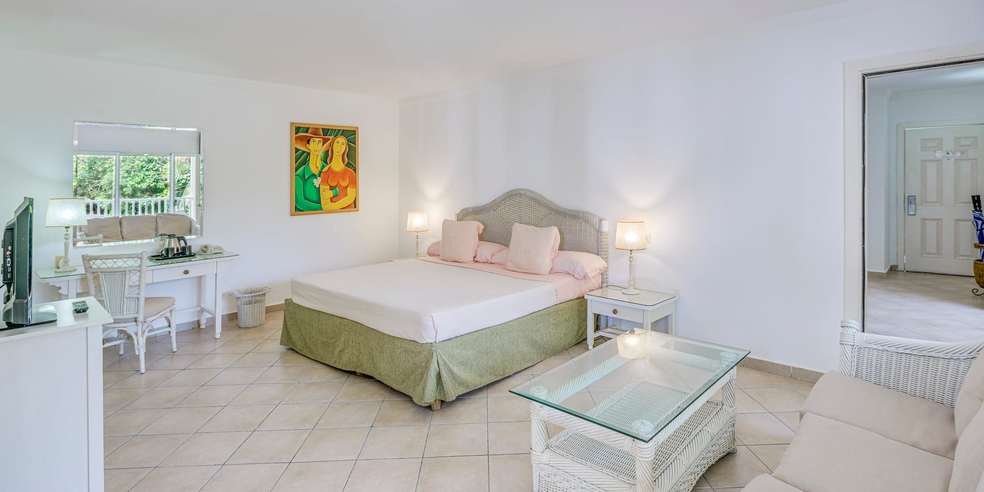 a bedroom with a bed and a table