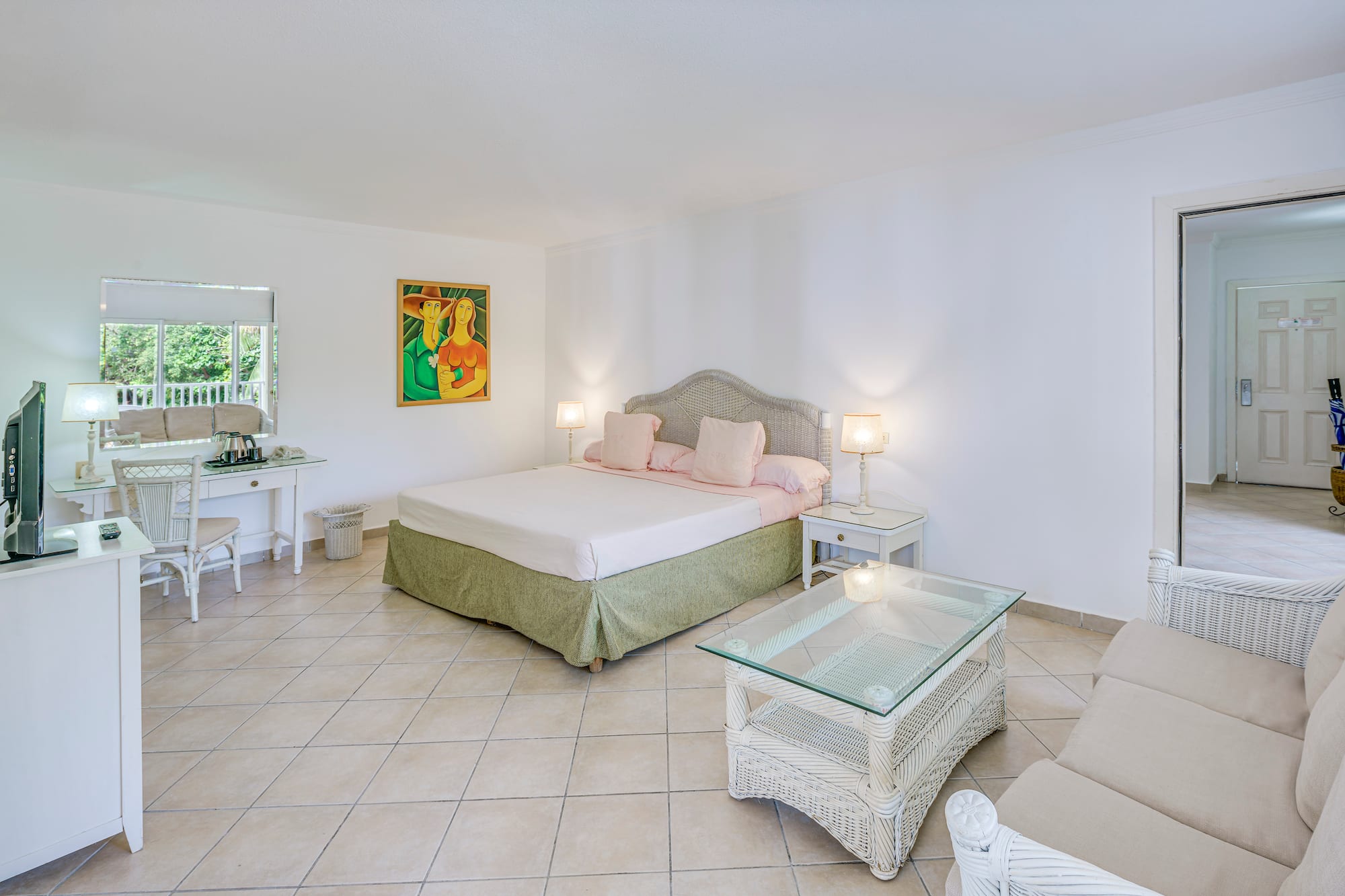 a bedroom with a bed and a table