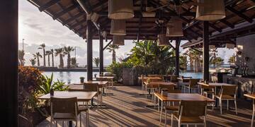 a restaurant with tables and chairs