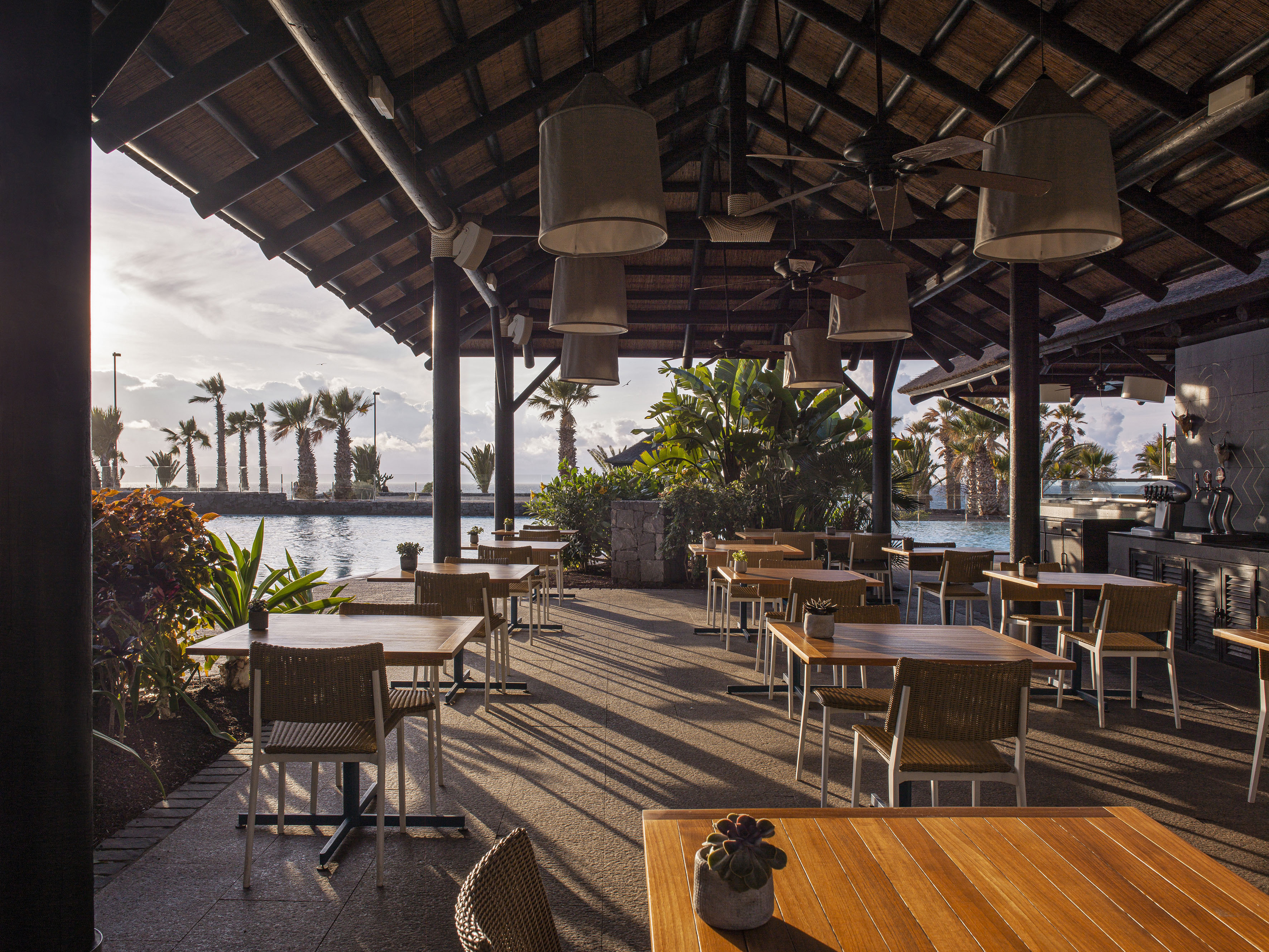 a restaurant with tables and chairs