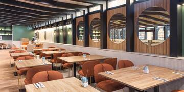 a room with tables and chairs