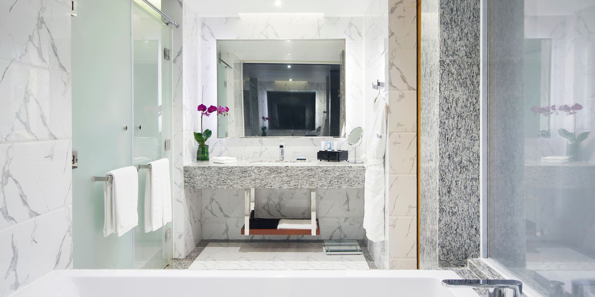 a bathroom with a sink and a bathtub