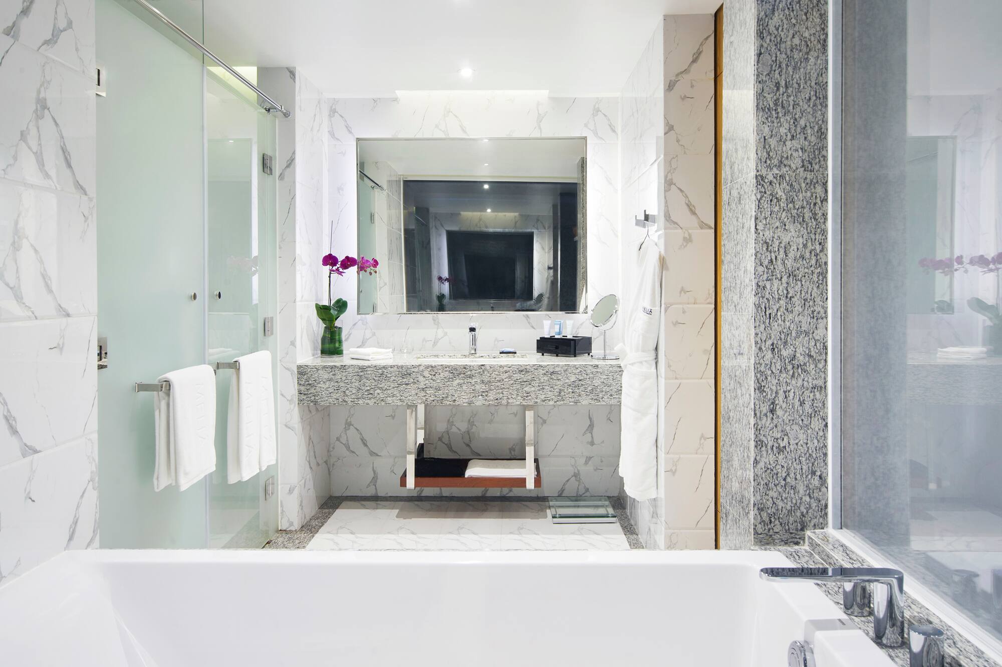 a bathroom with a sink and a bathtub