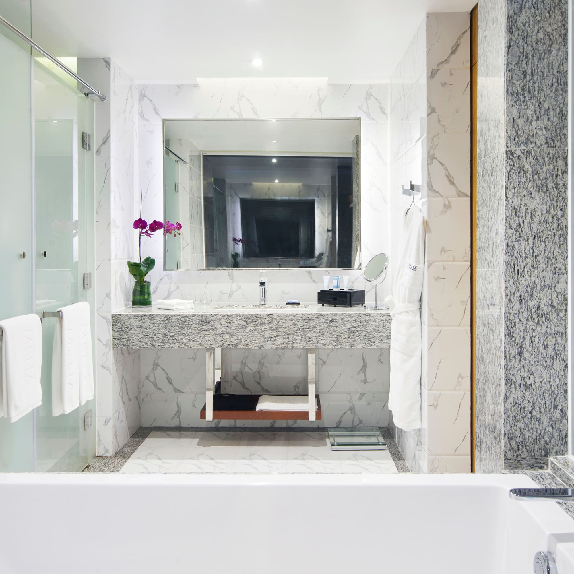 a bathroom with a sink and a bathtub