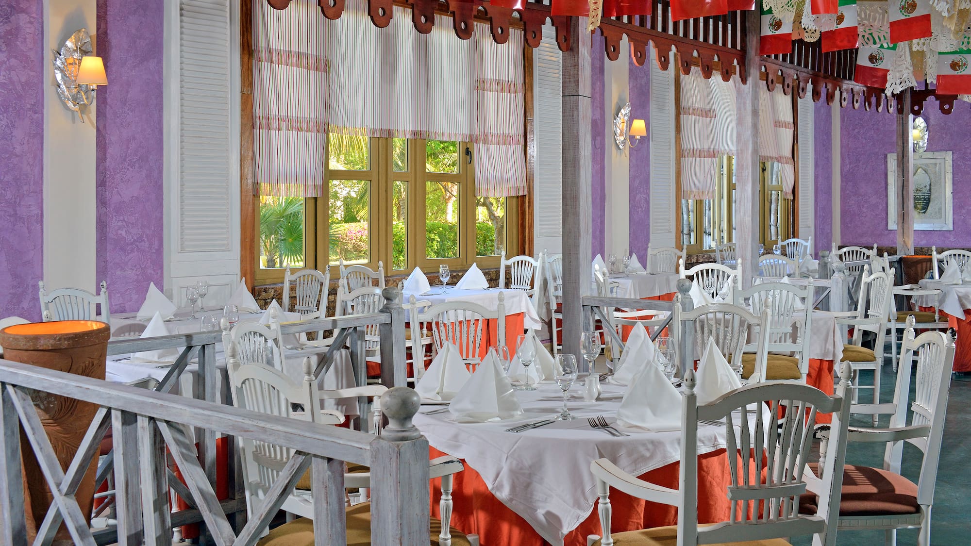 a room with tables and chairs