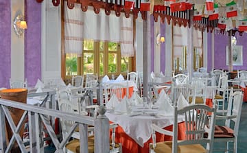 a room with tables and chairs