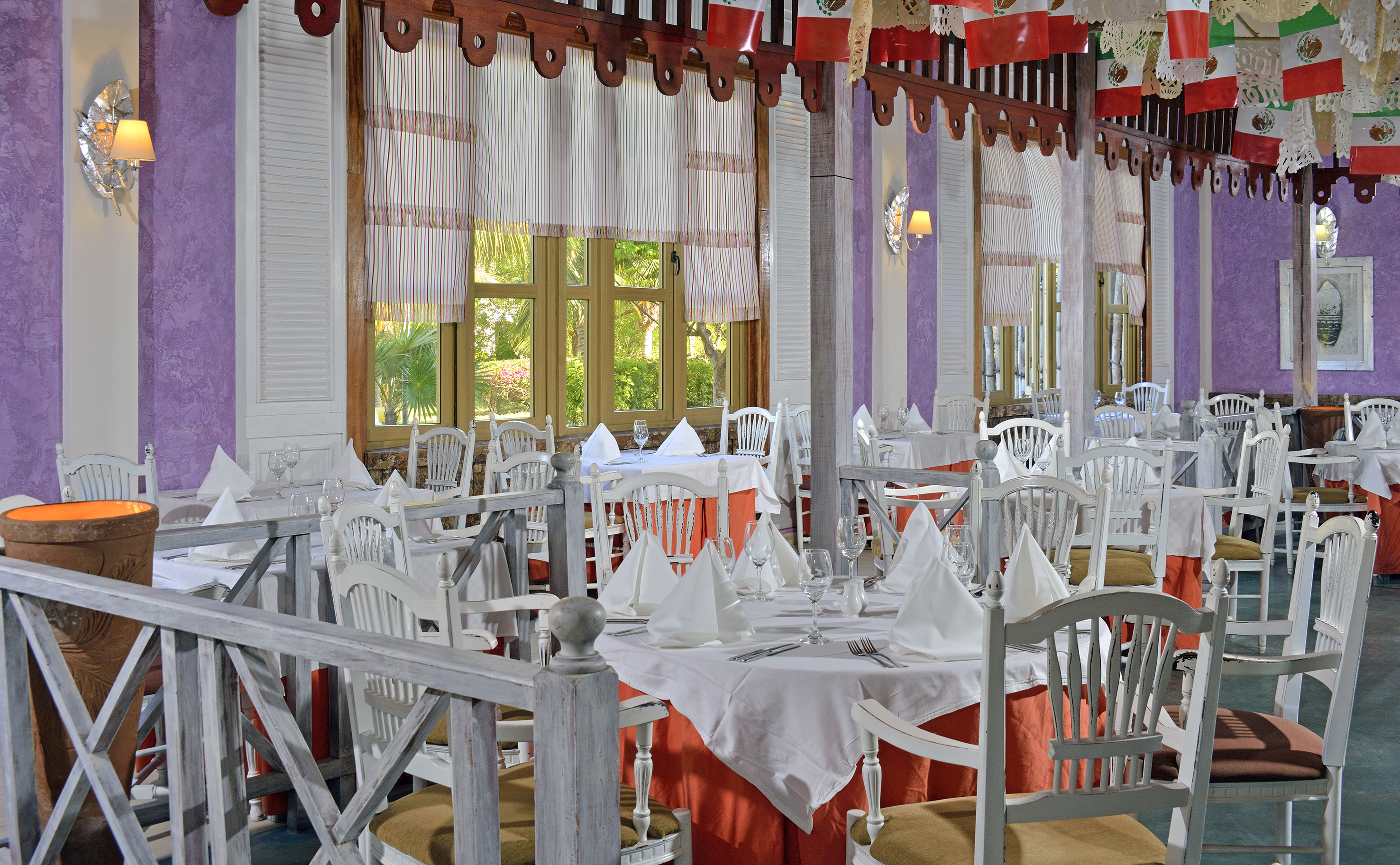 a room with tables and chairs