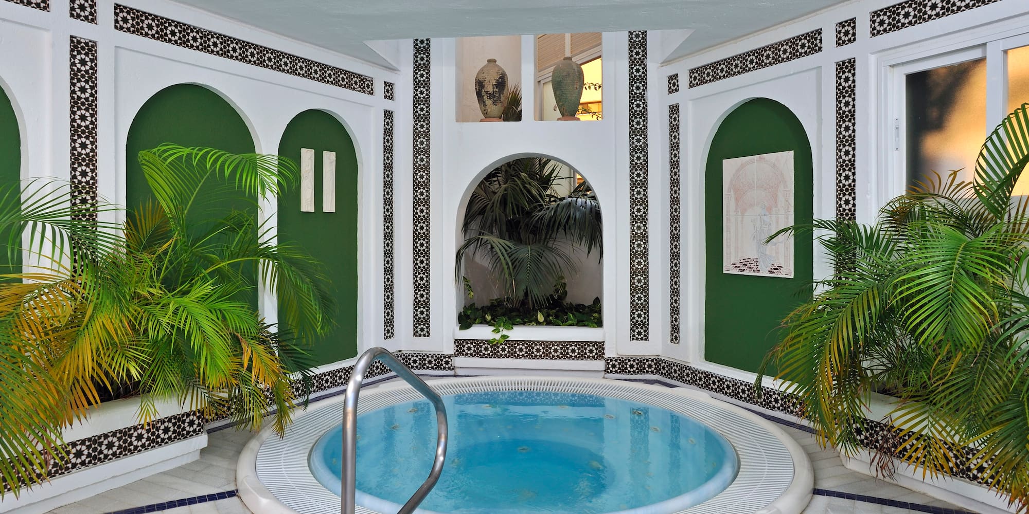 a indoor jacuzzi with a hot tub