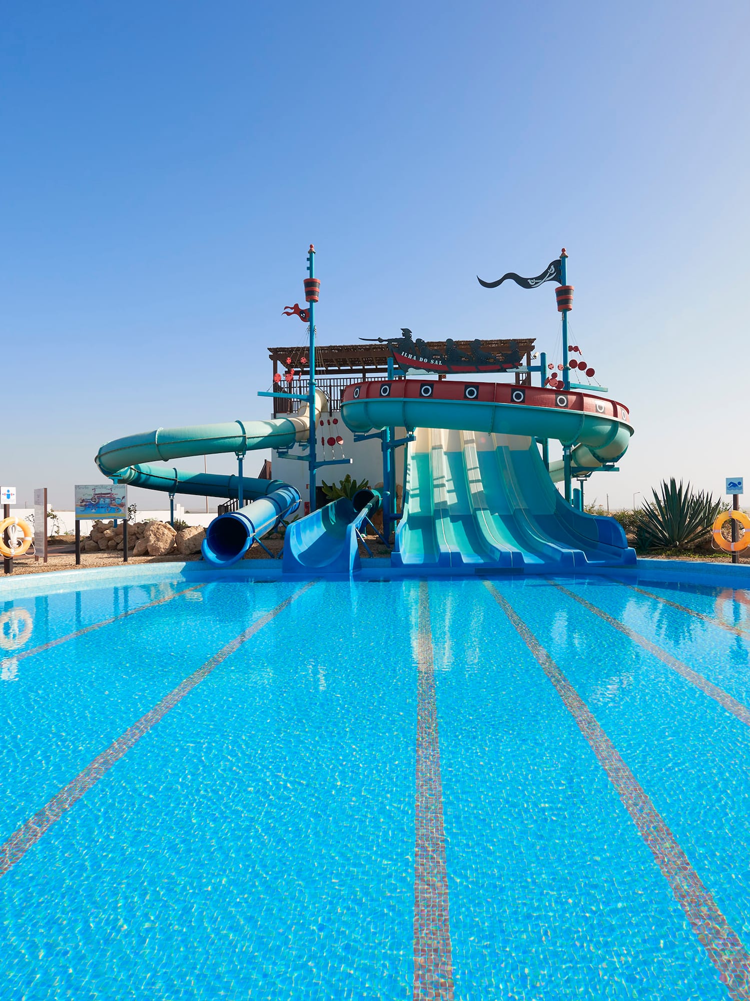 a water slide in a pool