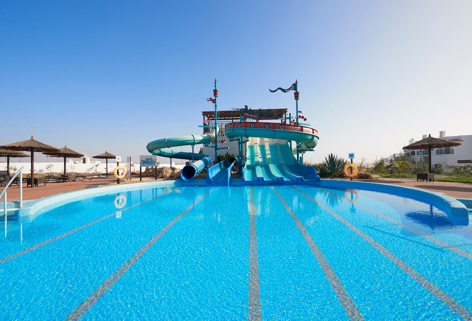 a water slide in a pool