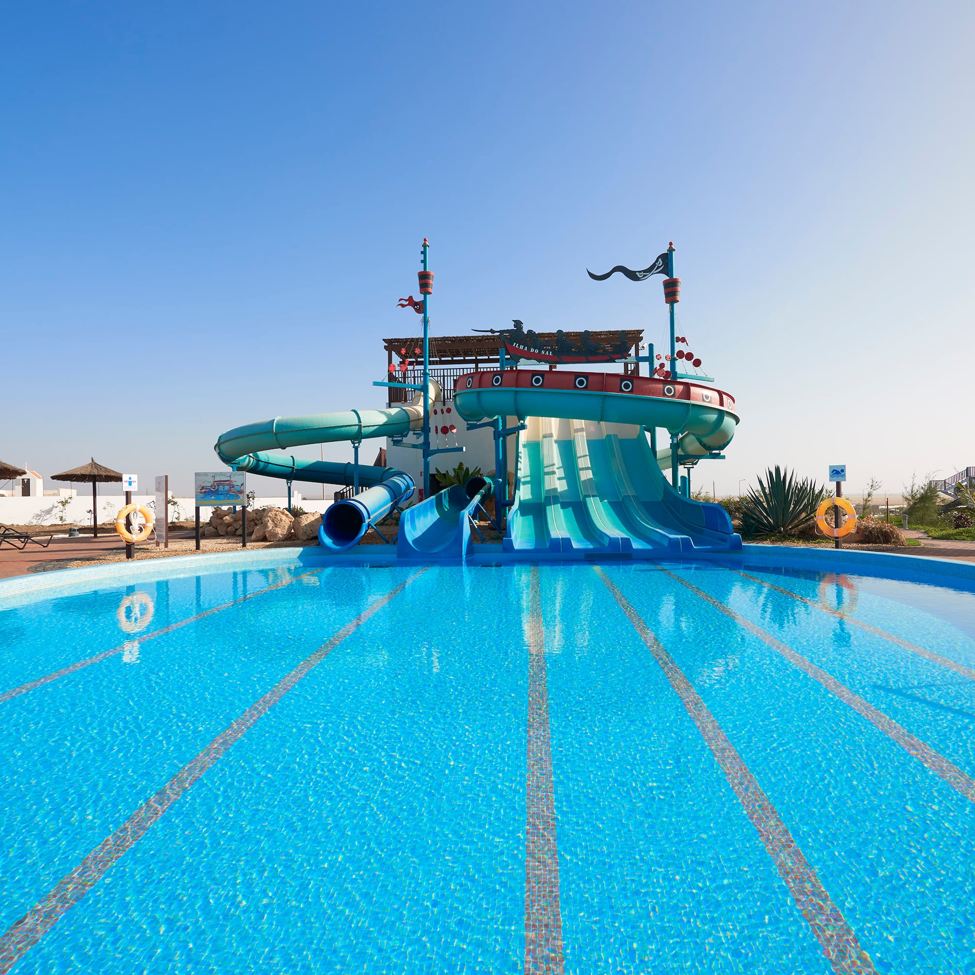 a water slide in a pool