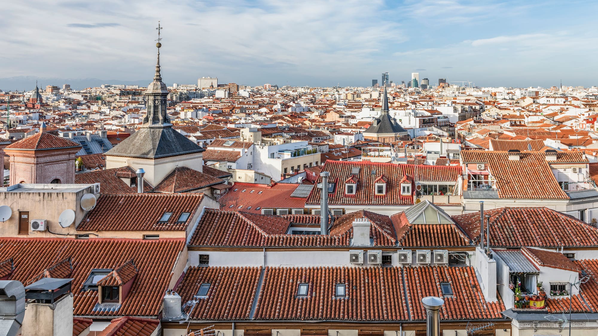 a city with many red roofs