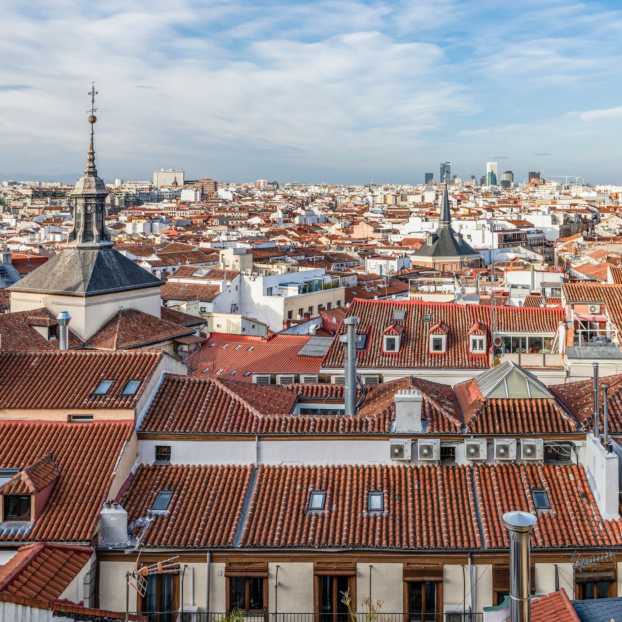 a city with many red roofs