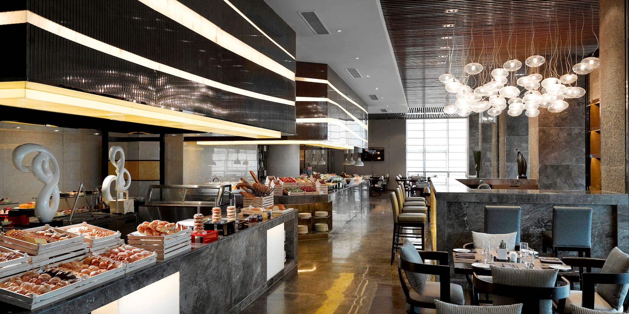 a restaurant with a buffet and a large counter