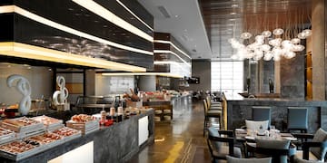 a restaurant with a buffet and a large counter