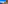 Hiker on a rocky mountain trail above clouds with clear blue sky.