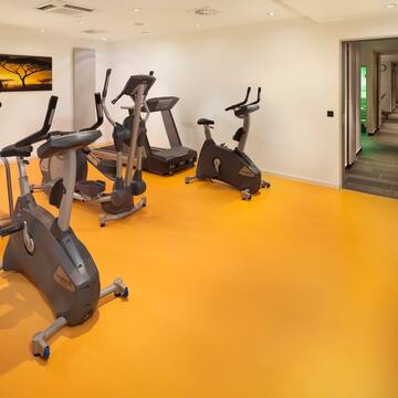 a room with exercise bikes