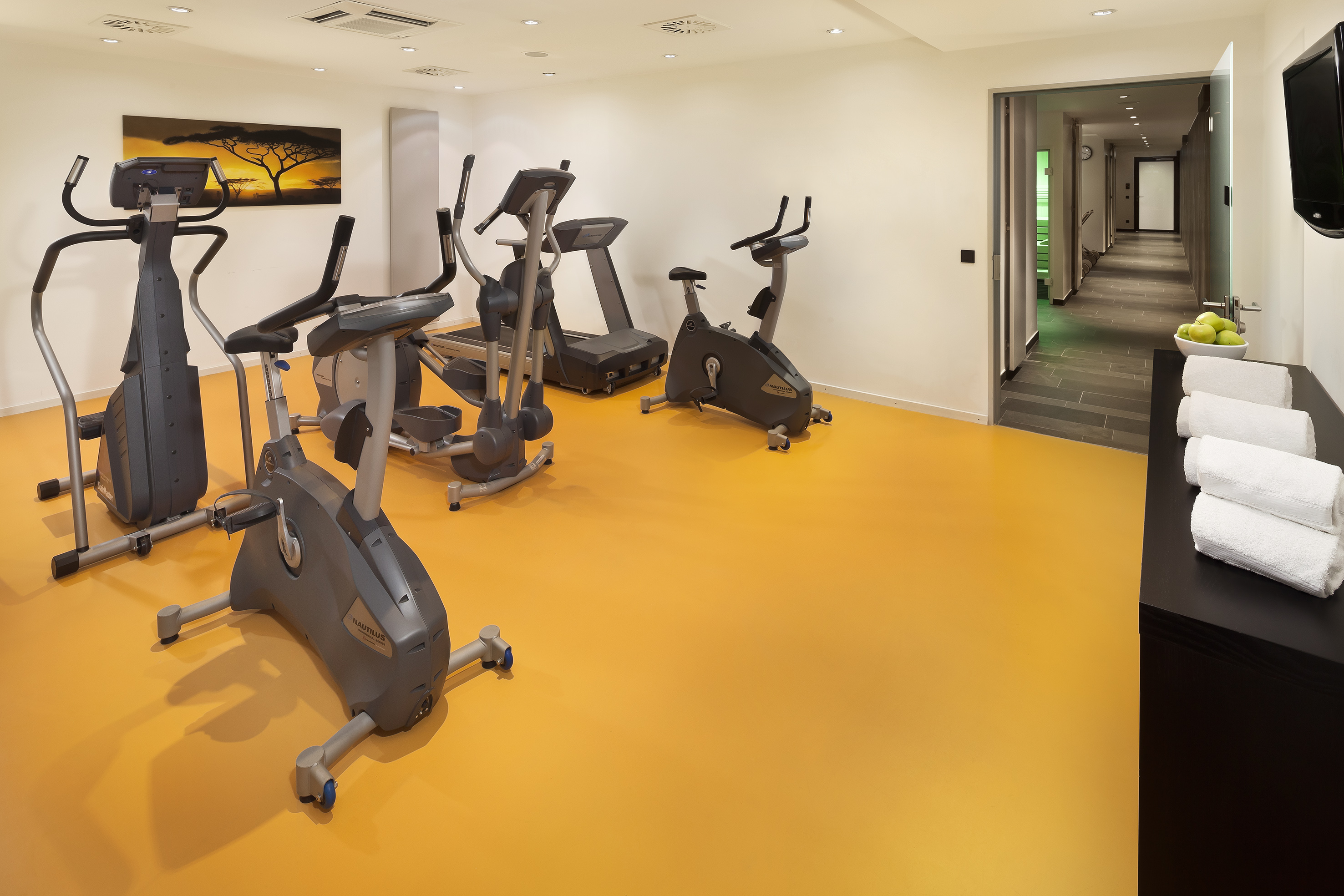 a room with exercise bikes