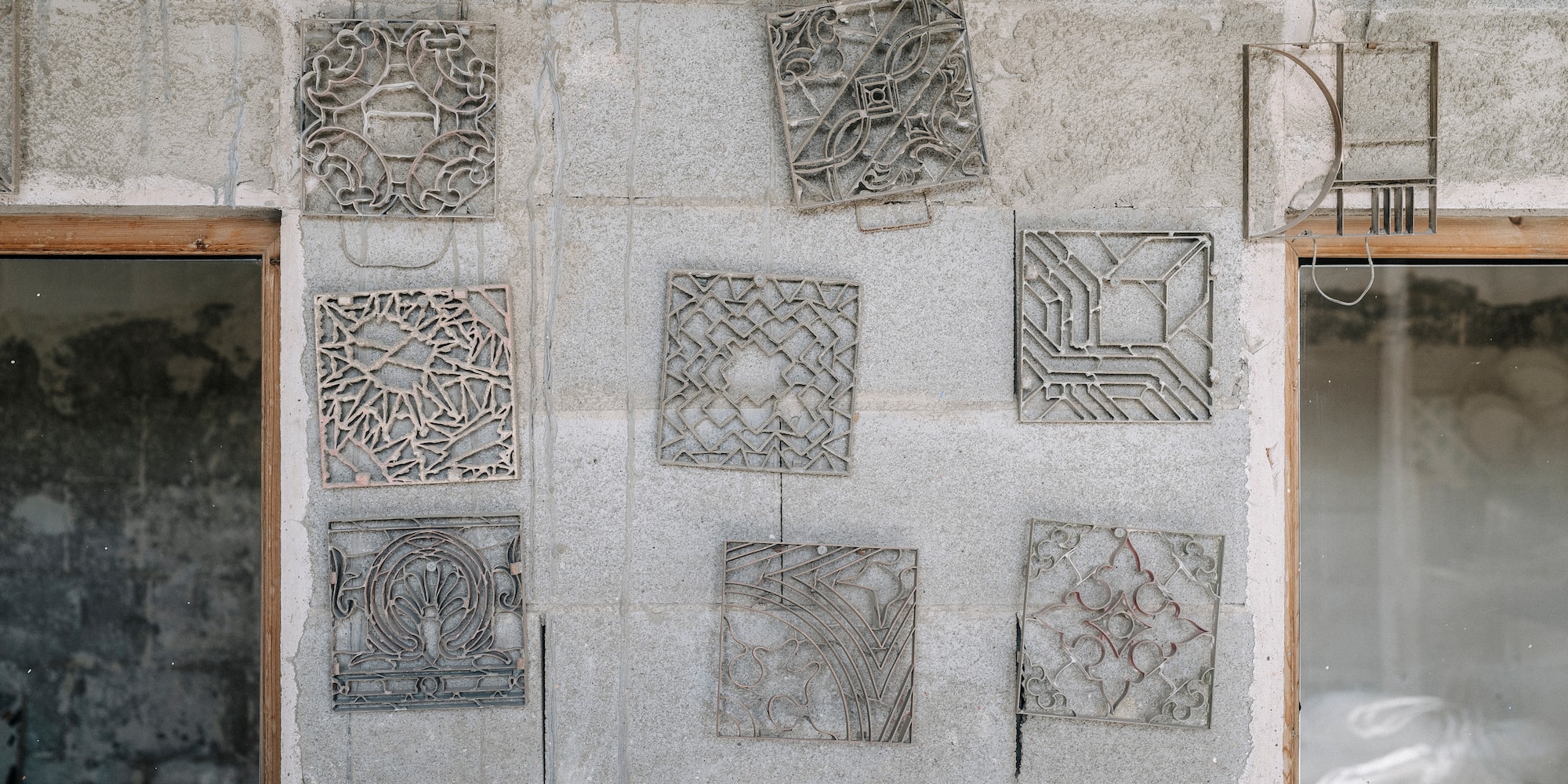 a group of metal art on a wall