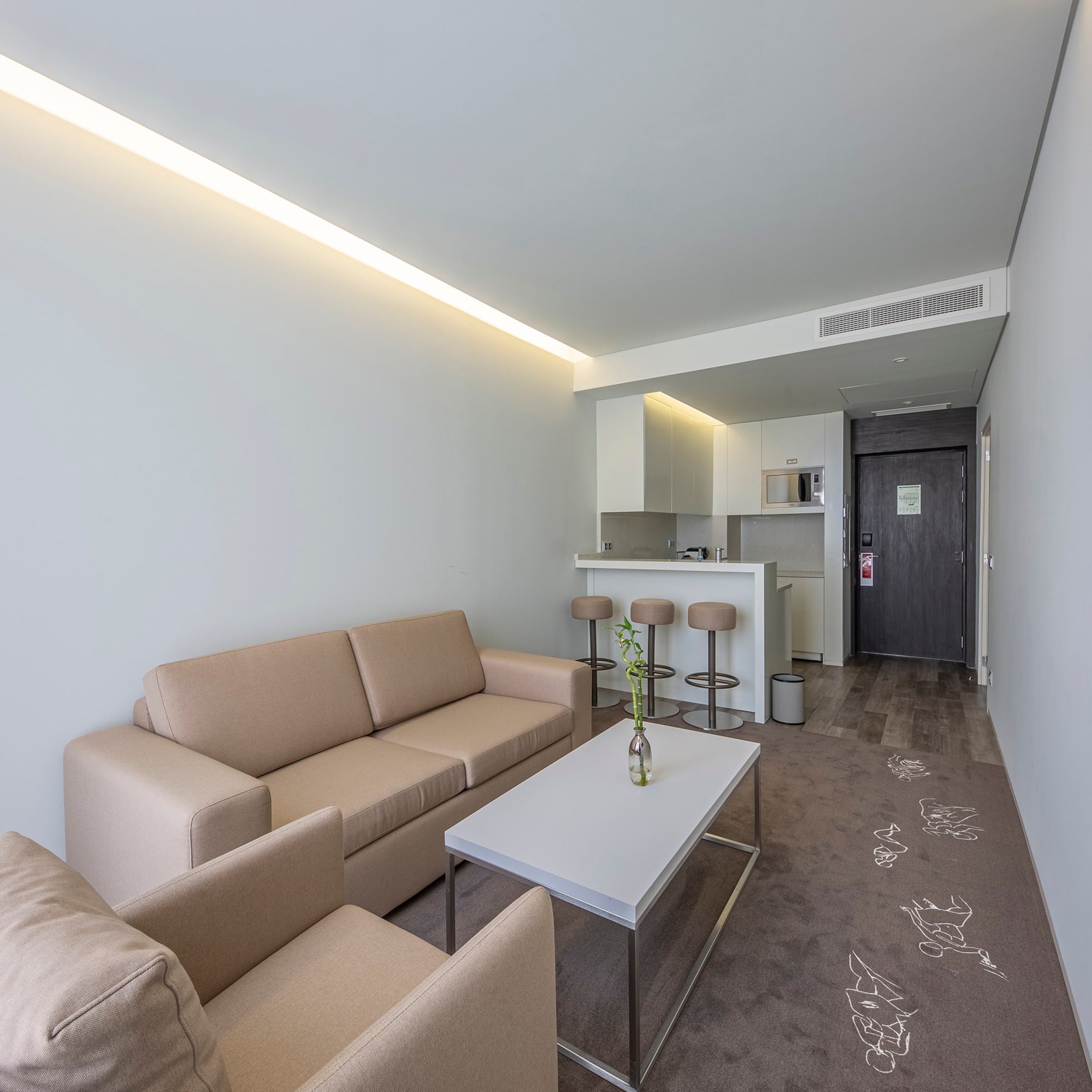 a living room with couches and a table