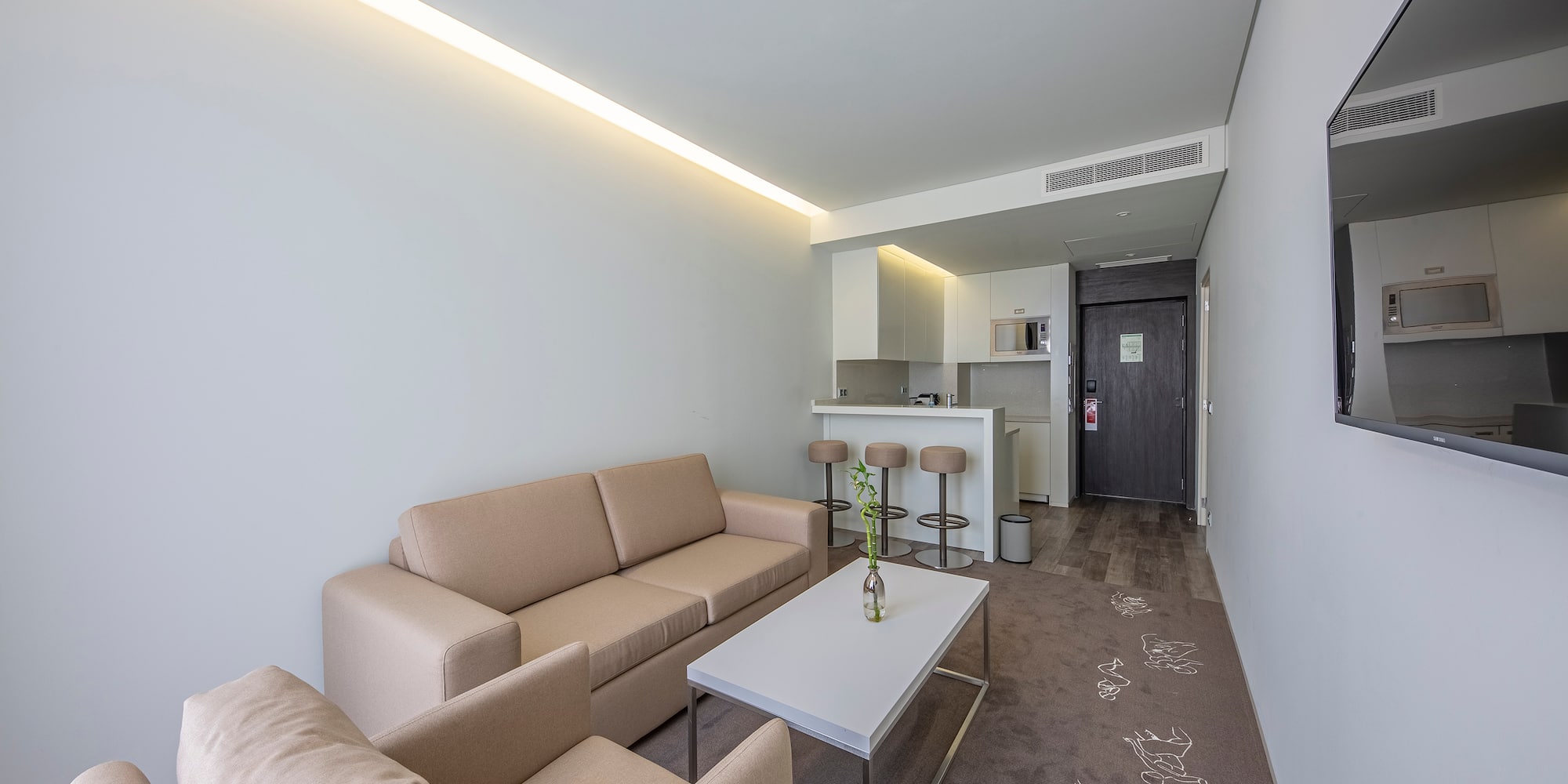 a living room with couches and a table