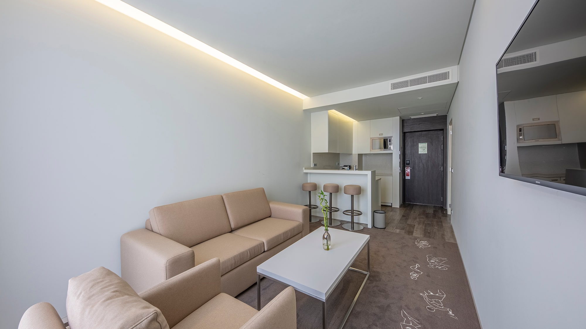 a living room with couches and a table