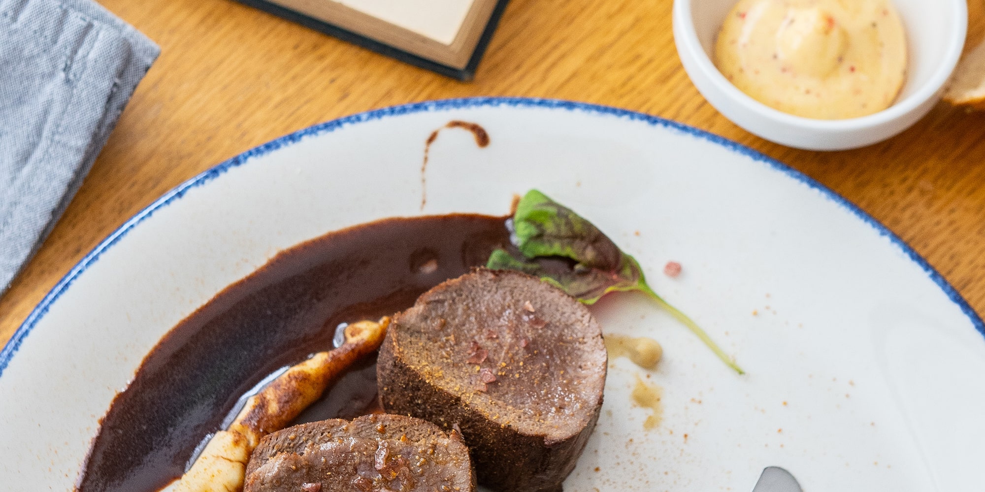 a plate of food with a fork and knife