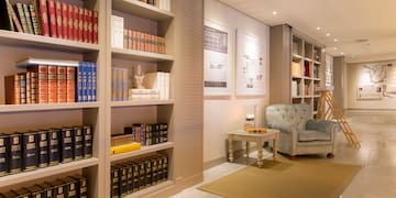 a room with bookshelves and a couch