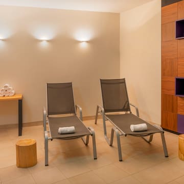 a room with chairs and a table